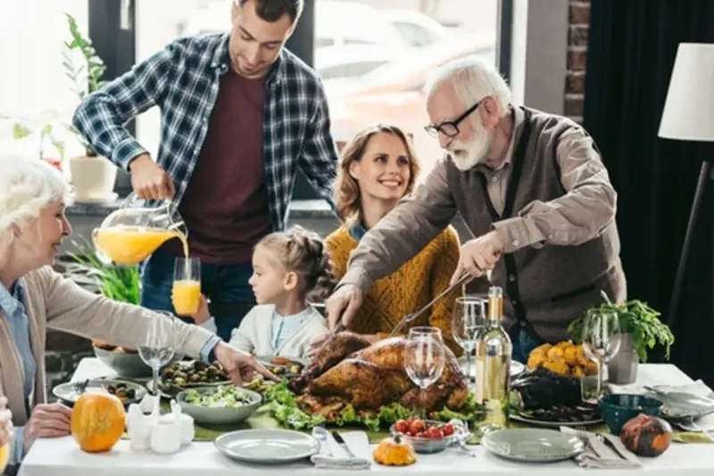 beautiful happy family celebrating thanksgiving day together